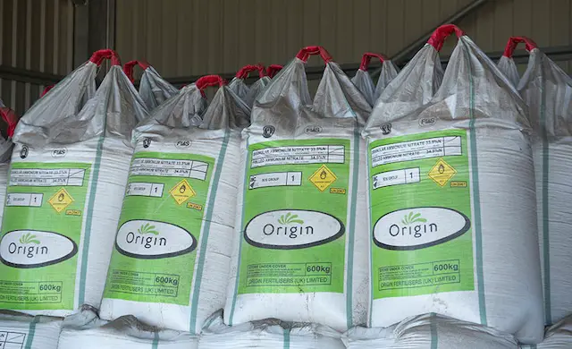 origin fertilizer spreader settings
